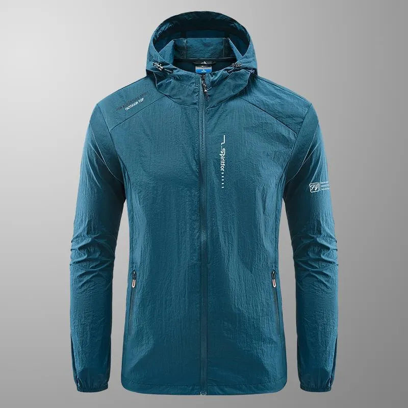 Man wearing a lightweight grey hooded nylon summer jacket for sun protection.