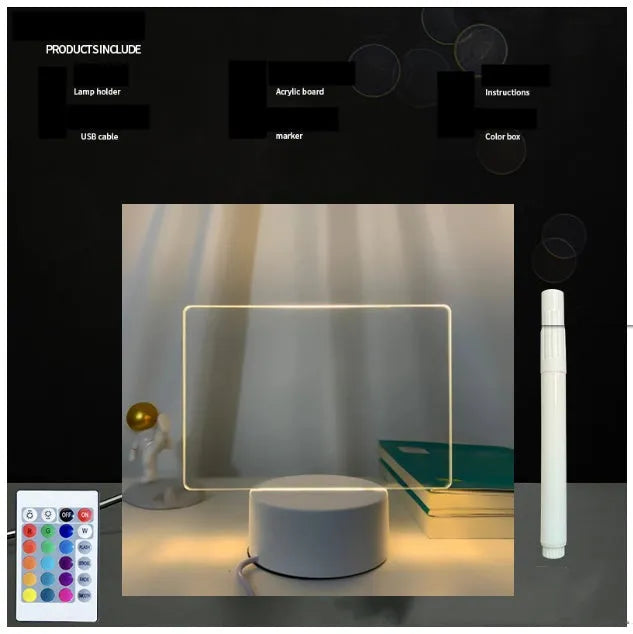 3D acrylic LED message board night light with remote control and marker pen on a desk.