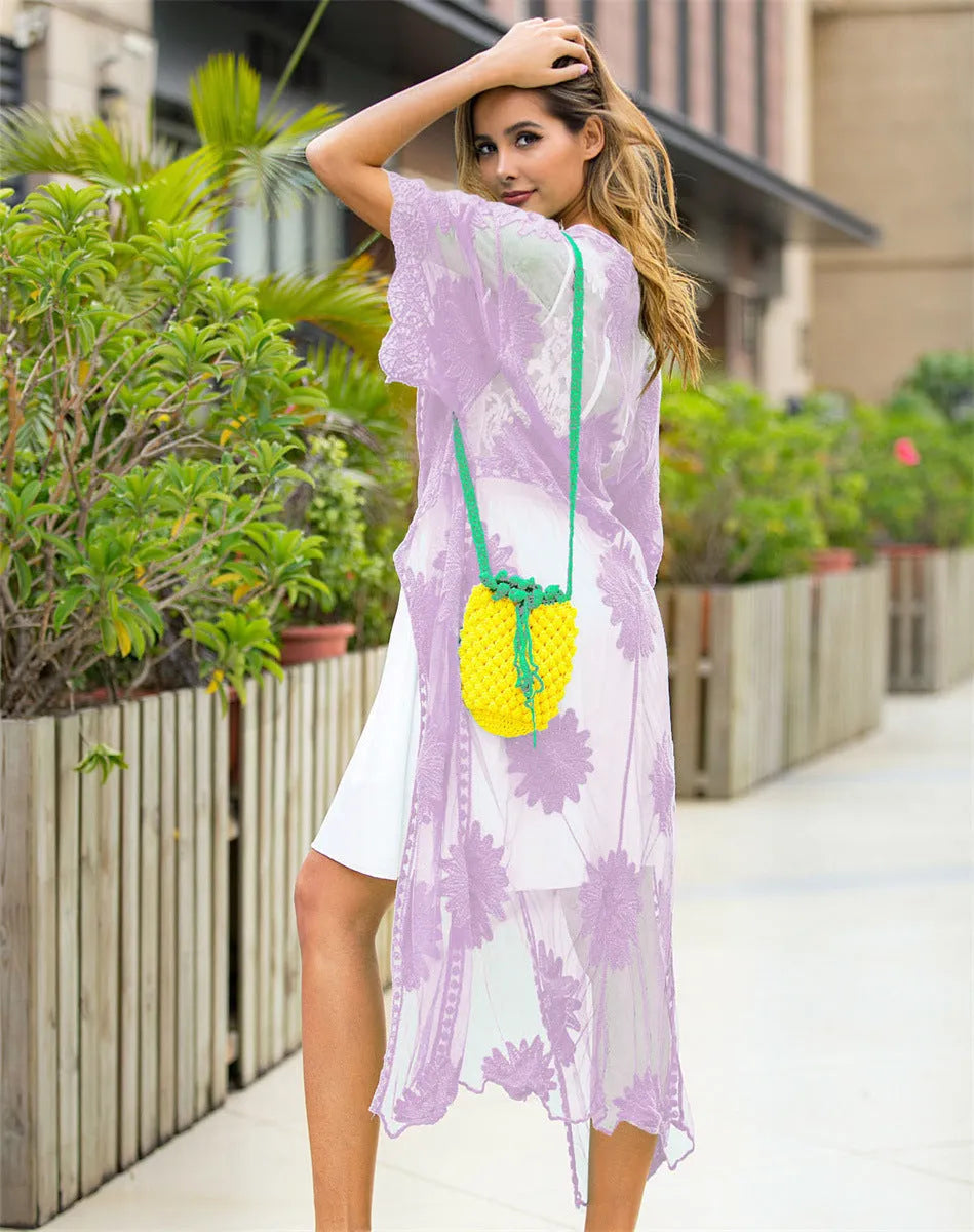 Light purple beach cover-up dress with lace embroidery detail, shown as swimsuit blouse or cardigan
