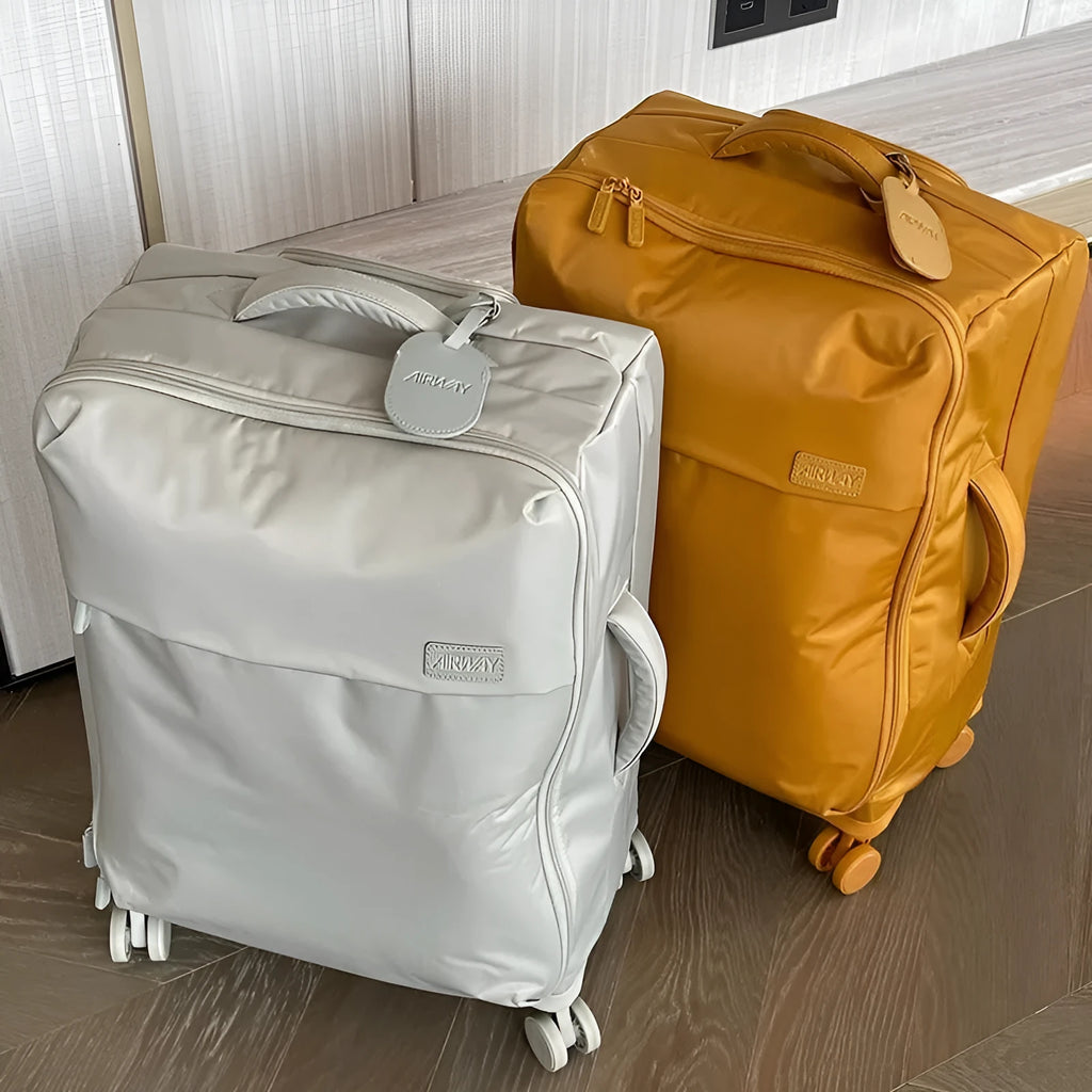 Ultra-light waterproof Oxford cloth suitcase in bluestone green with universal wheels