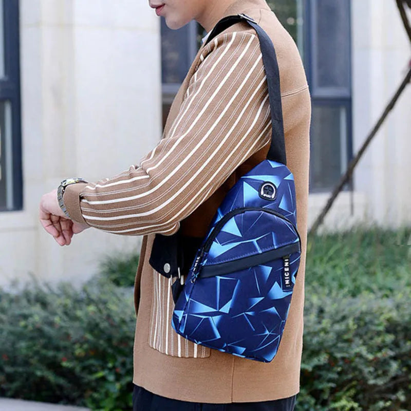 Blue print sling chest bag for men with crossbody strap and visible earphone hole