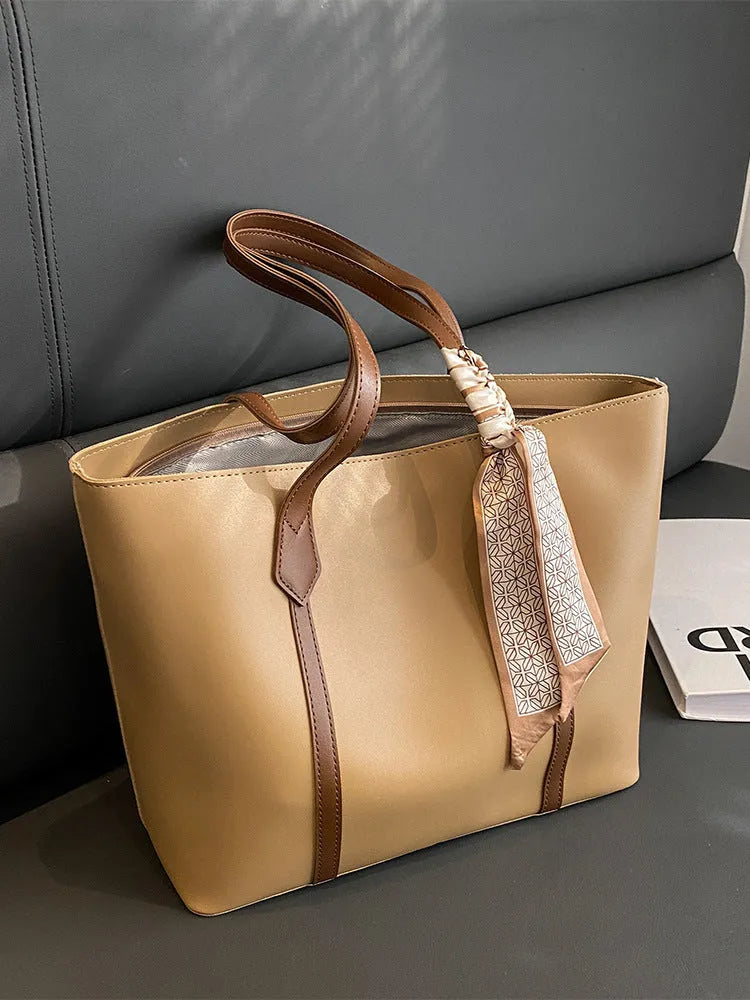 Women's large-capacity soft bucket shoulder bag in multiple colour options with zipper pocket