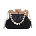Women's woven straw shoulder bag with pearl chain details showing interior organisation compartments