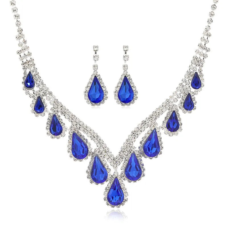 Royal Blue White K alloy jewellery set with a regular chain necklace and earrings on display