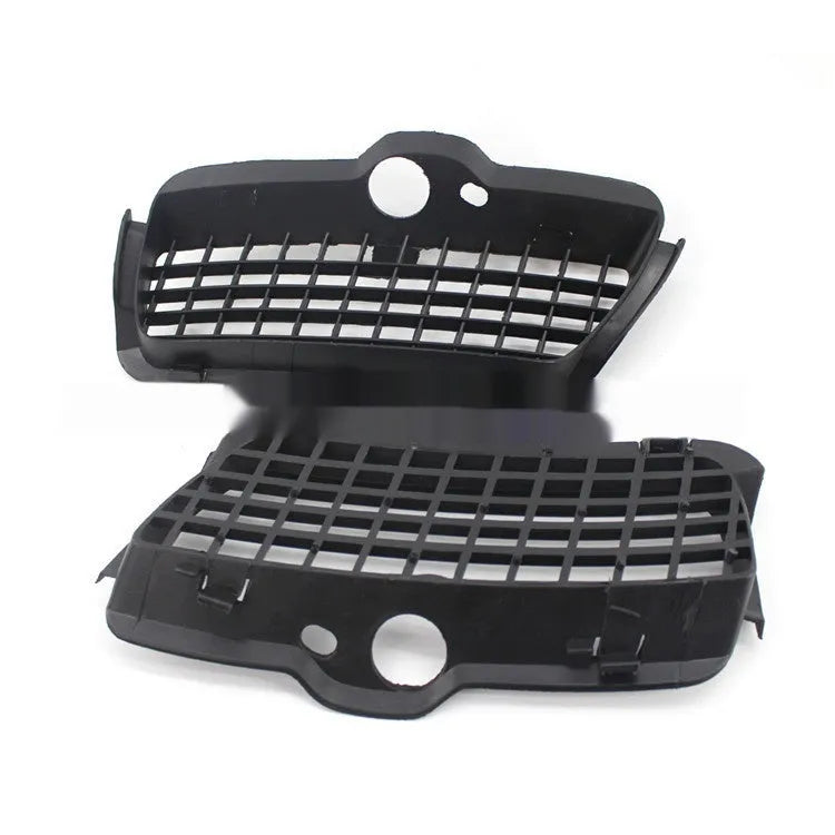 Black ABS plastic Volkswagen Golf 3 front fog light cover and lower grille replacement pair.
