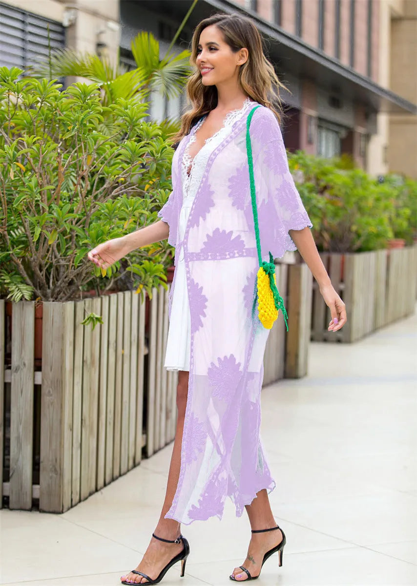 Light purple beach cover-up dress with lace embroidery detail, shown as swimsuit blouse or cardigan