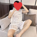Men's ice silk vest and shorts pyjama set in white, black, and grey summer sleepwear