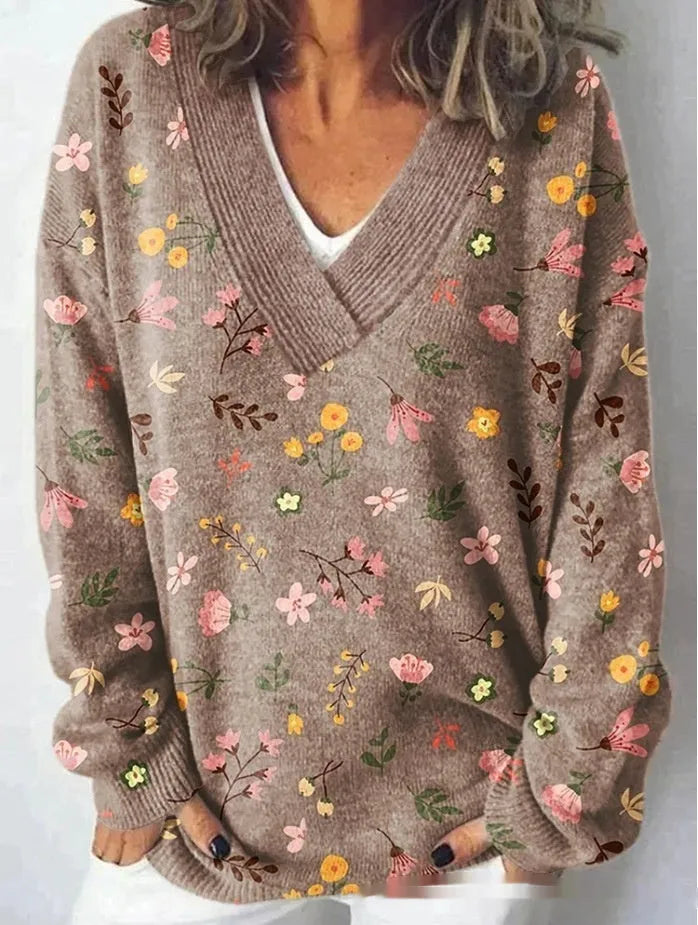Women's V-neck long sleeve sweatshirt with a detailed 3D floral print pattern.