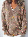 Women's V-neck long sleeve sweatshirt with a detailed 3D floral print pattern.