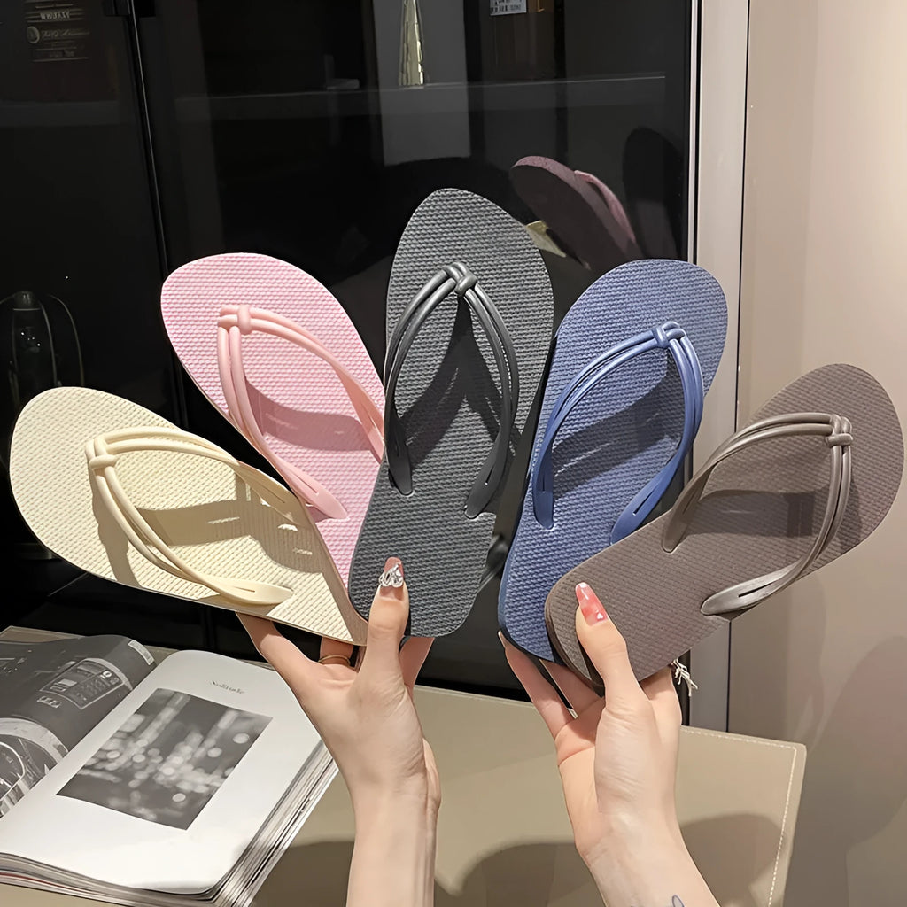 Men's casual PVC flip flops in beige with toe-covering style and injection moulded sole.