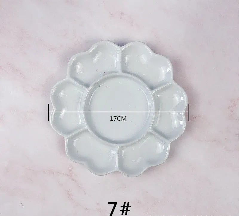 White ceramic plum blossom shaped paint palette for watercolour acrylic oil painting
