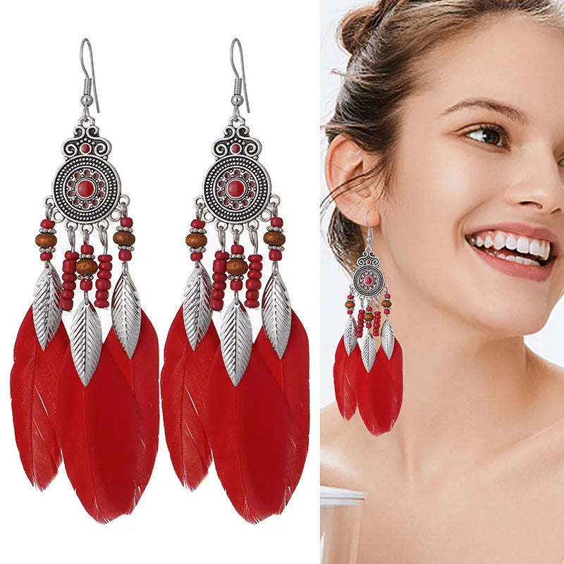 Round drop feather earrings with leaf pattern in alloy metal, available in multiple colours