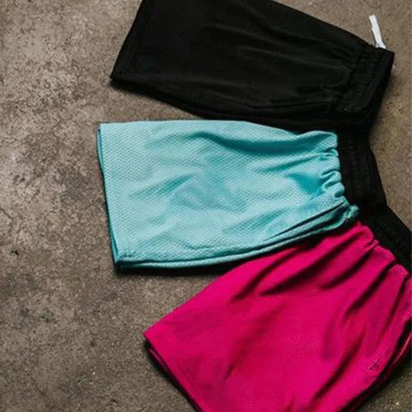 Men's solid colour mesh quick-drying shorts for running and fitness in summer.