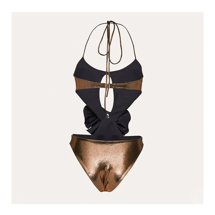 Gold coloured halter neck one piece swimsuit with a handmade hollow out flower design on the front.