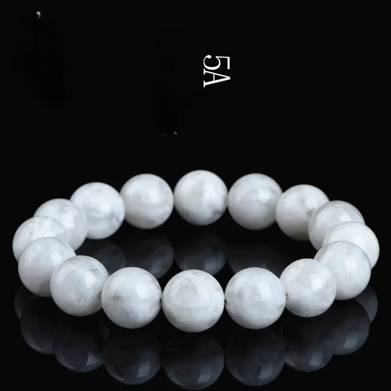 Women's crystal bracelet with natural blizzard snowflake round beads and traditional charm elements