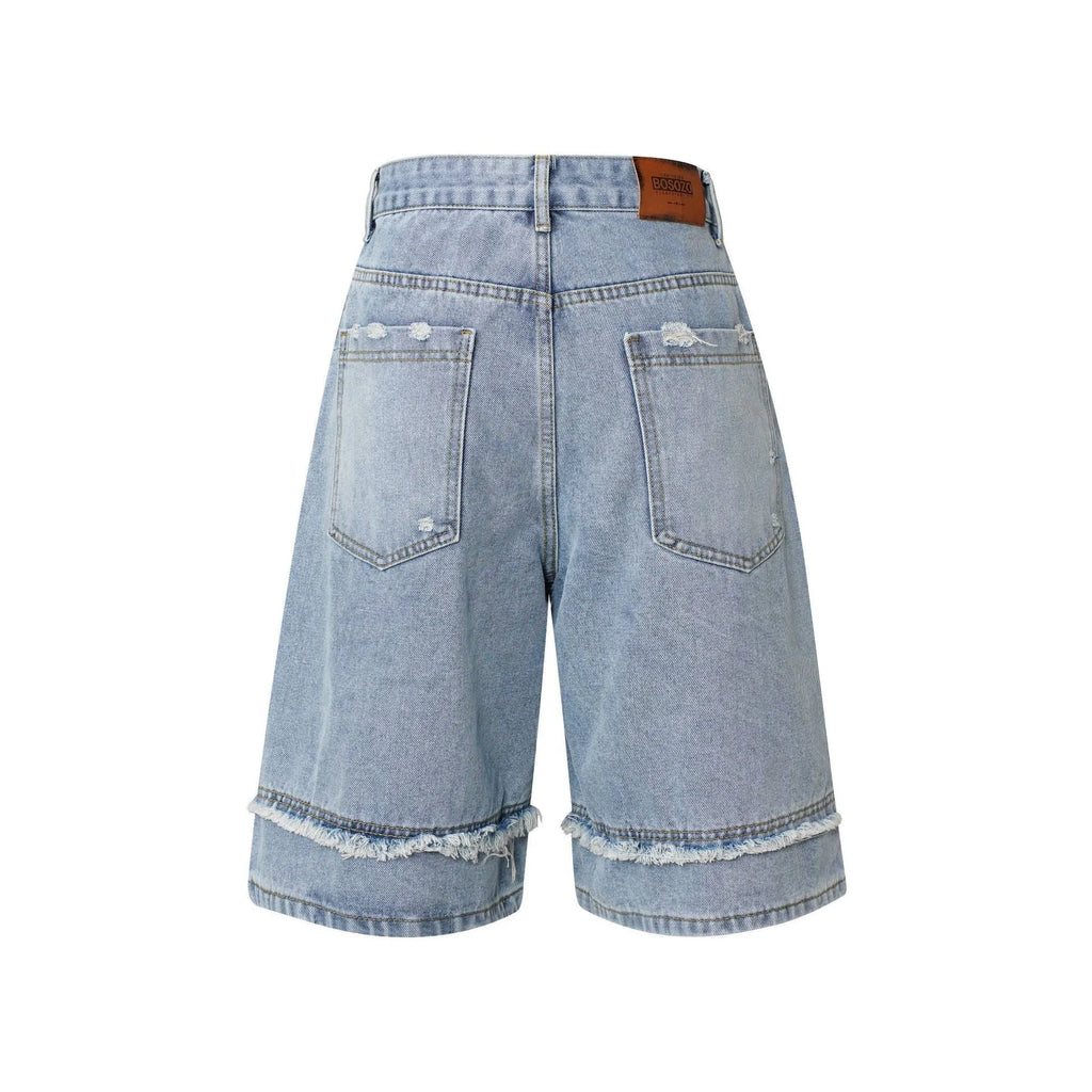 Men's distressed raw edge denim shorts in straight leg cropped fit, shown in dark blue.