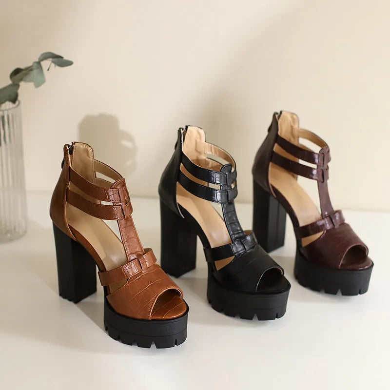 Women's black platform high heel sandals with a back zip and round toe on a rubber sole.
