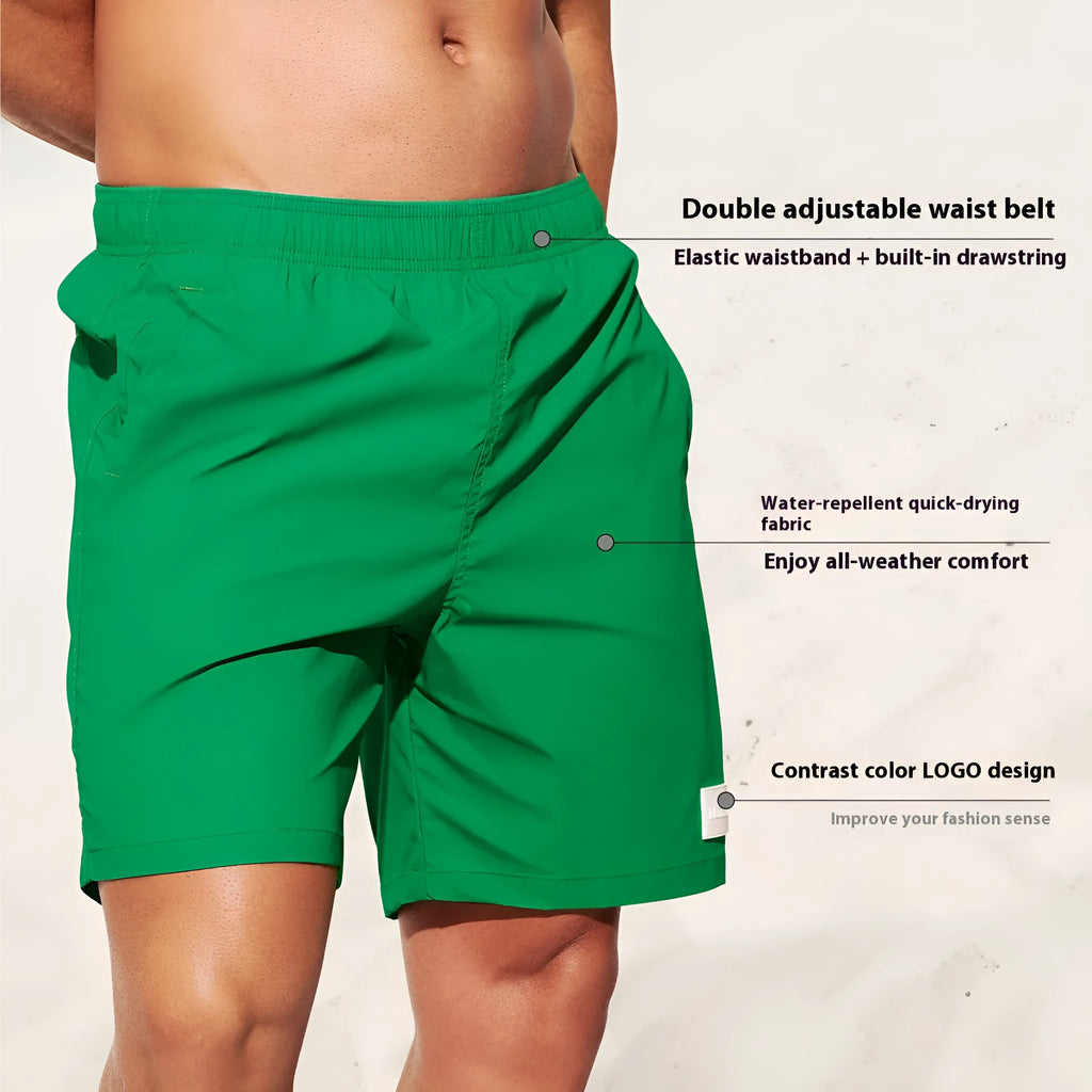 Men's quick-drying nylon sports shorts in solid colours with straight leg opening.