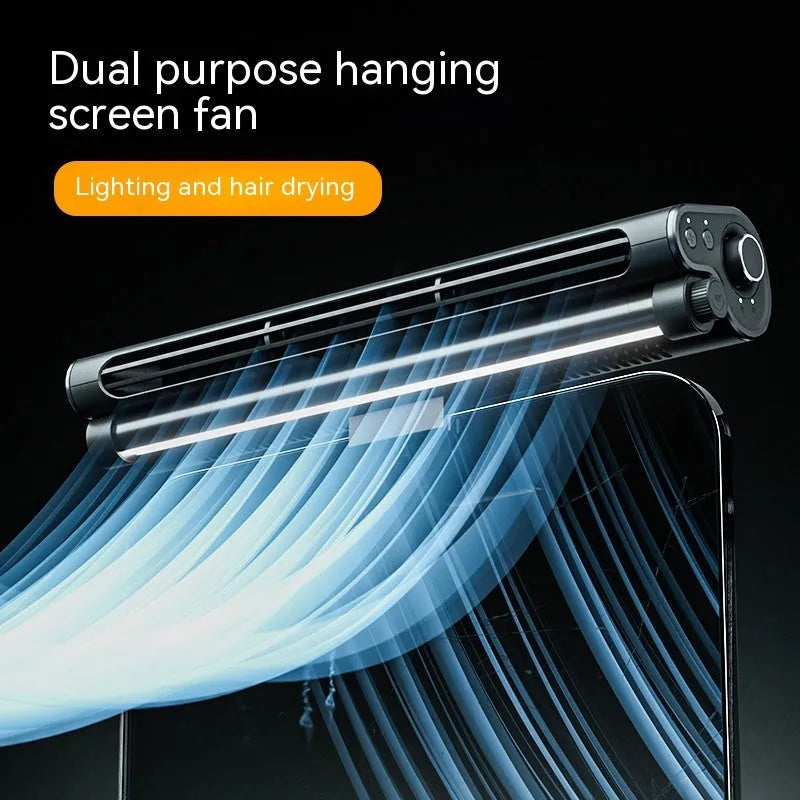 Black USB bladeless fan clipped to laptop screen with integrated lighting lamp and three-speed button control