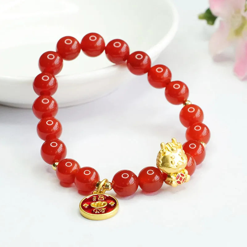 Close-up of a red agate bead dragon zodiac bracelet with 8mm beads in a Chinese style.