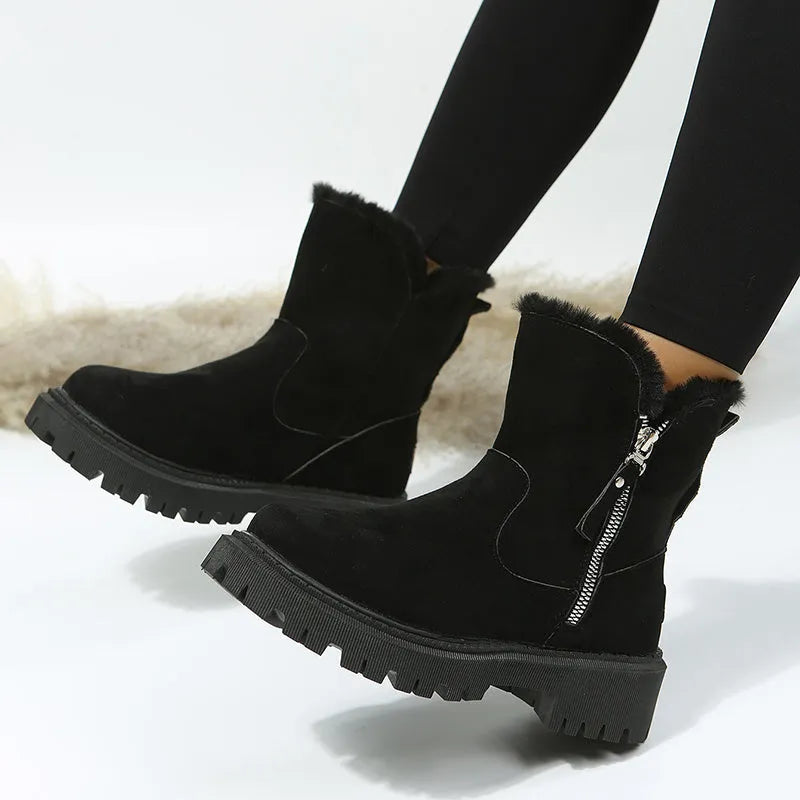 Women's black high-top snow boots with side zipper, plush lining, and non-slip rubber sole