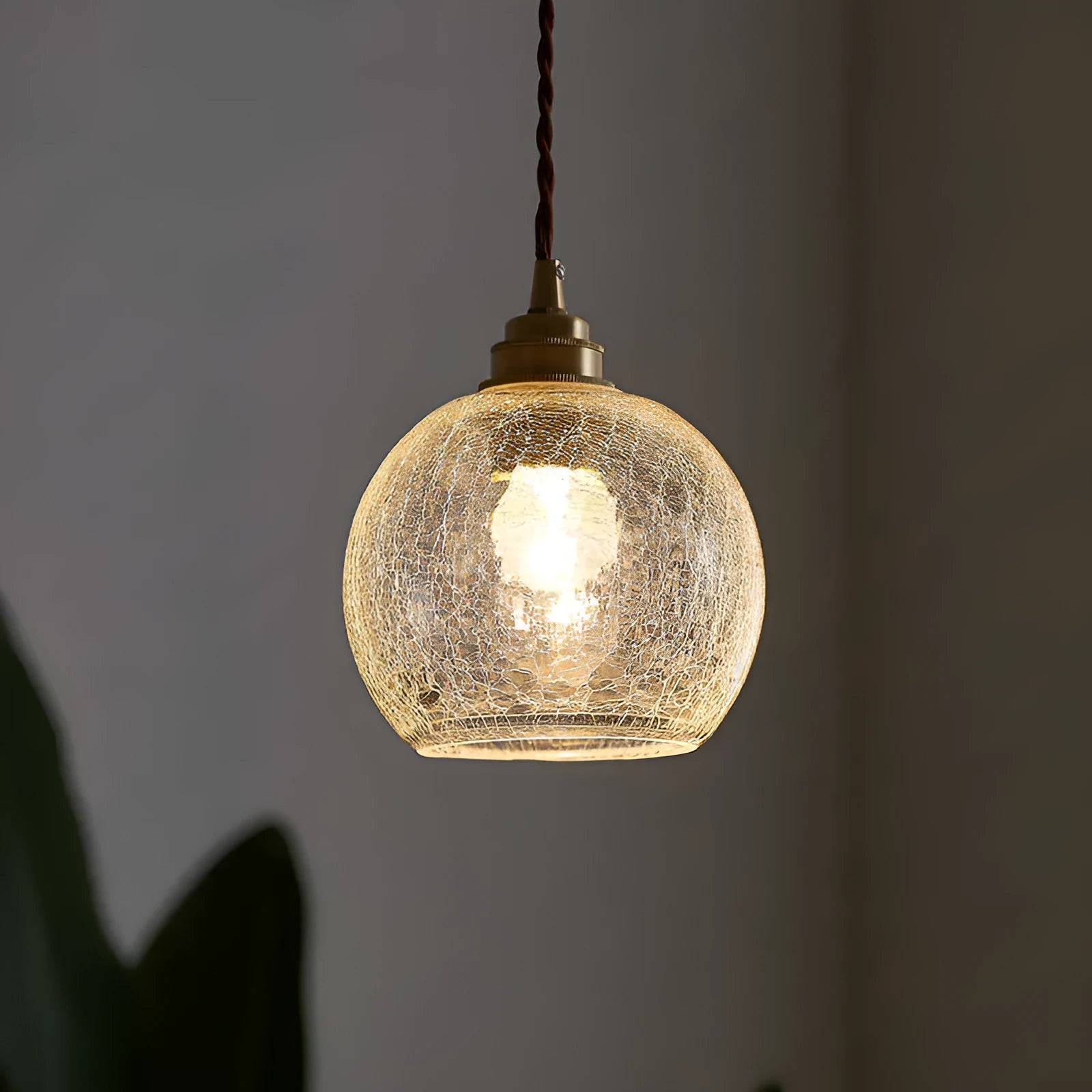 Retro-style brass and glass ball chandelier ceiling light with copper body and spherical shades.