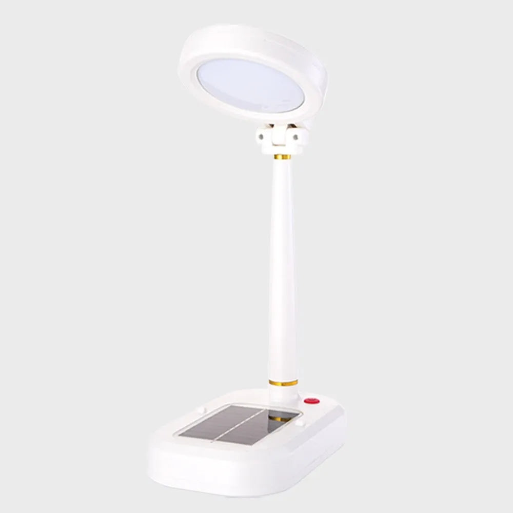 Ivory white solar charging table fan with integrated LED study lamp on desk