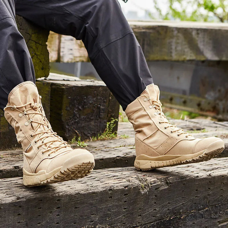 Black and sand coloured Yulong tactical desert combat boots for outdoor climbing and sports.