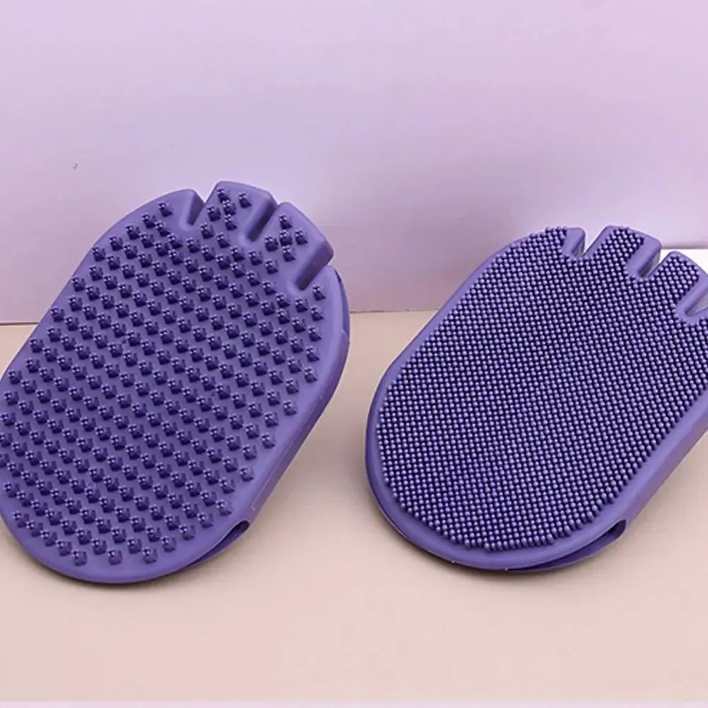 Purple massaging pet shampoo brush with soft TPR bristles, dual-sided dog grooming tool on white background
