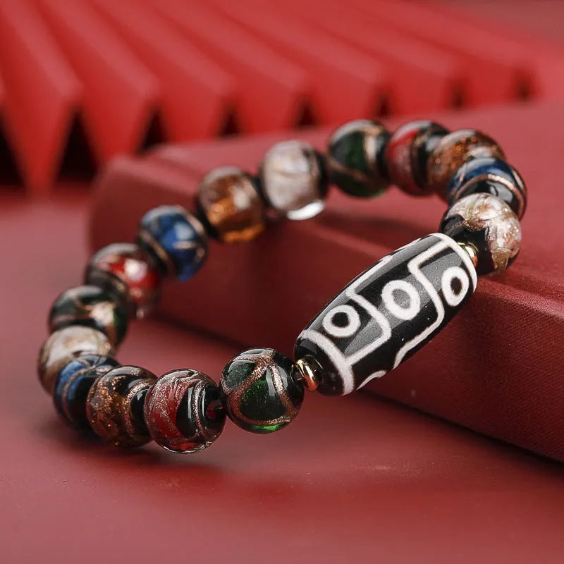 Handmade coloured glaze bracelet with auspicious patterns and year snake motif in Chinese style