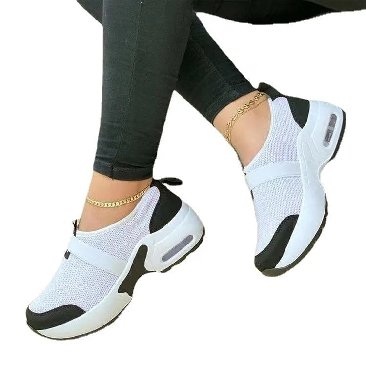 Women's white mesh flat sneakers with round toe and colour stitching details