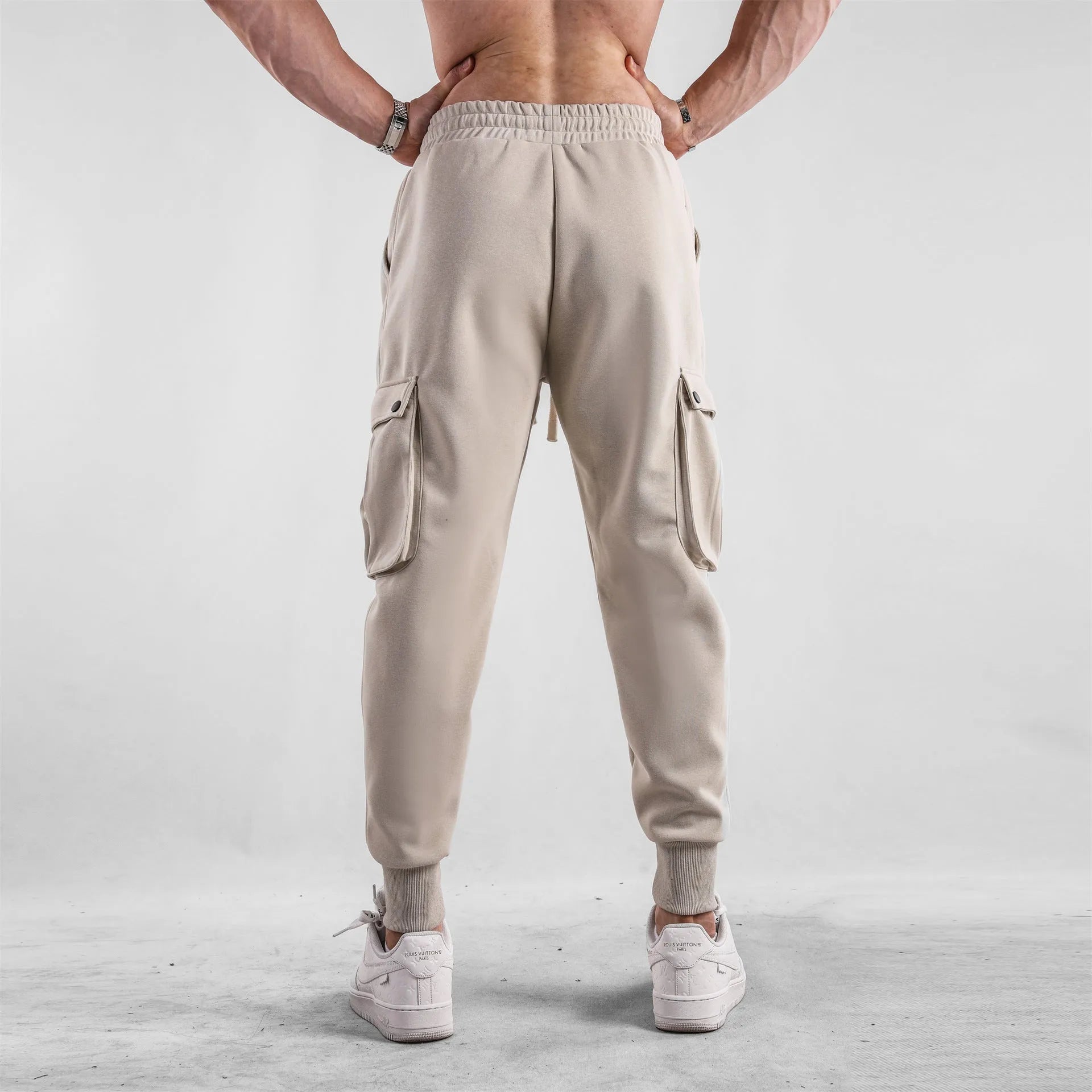 Men's loose fit cotton sports trousers with ankle tie detail and multiple pockets in various colour options