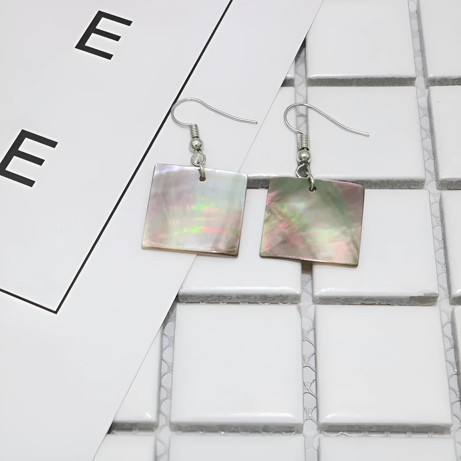 Women's geometric shell earrings in rectangular or square shape, retro natural style.