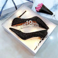 Women's wedding shoes with crystal embellishments and stiletto heels in black or silver