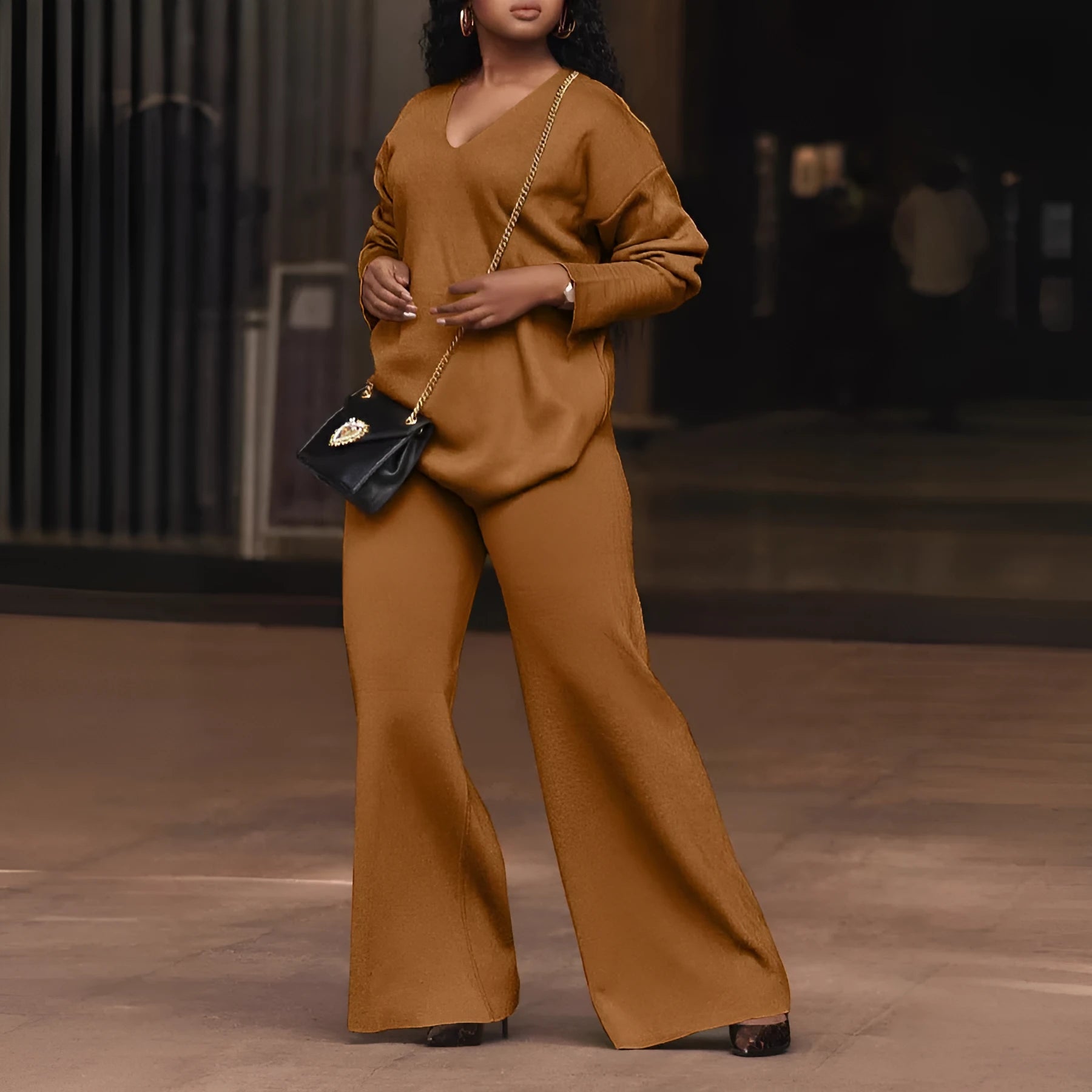Women's brown casual suit with long sleeves and full-length trousers made from thickened deerskin velvet fabric.
