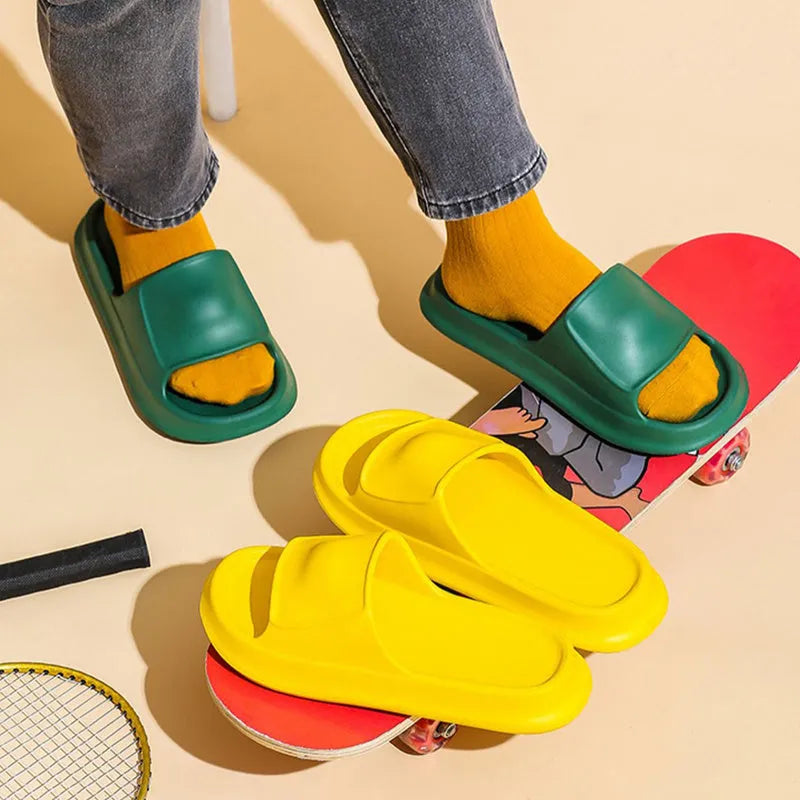 Pair of thick-soled EVA flip-flop slippers in a choice of seven colours on a white background.