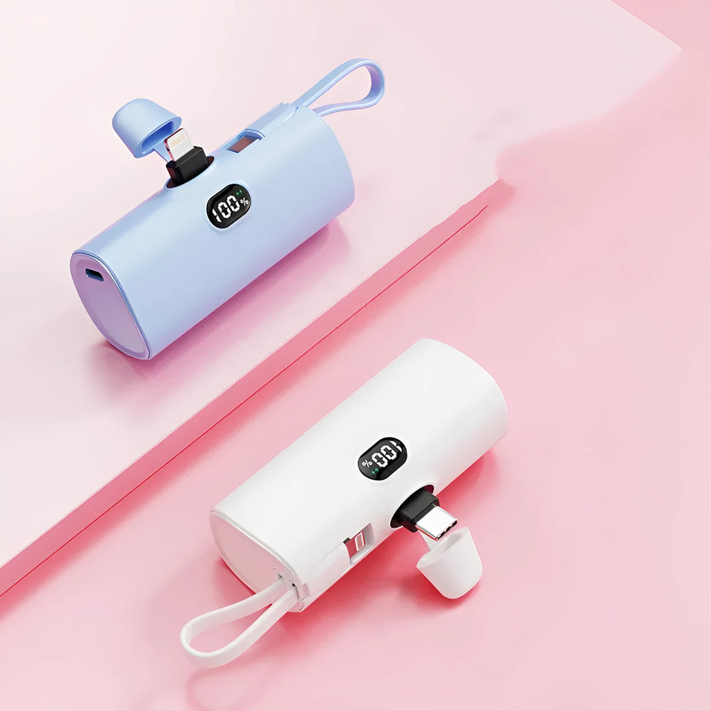 Compact wireless power bank with digital display showing battery percentage and built-in folding plug