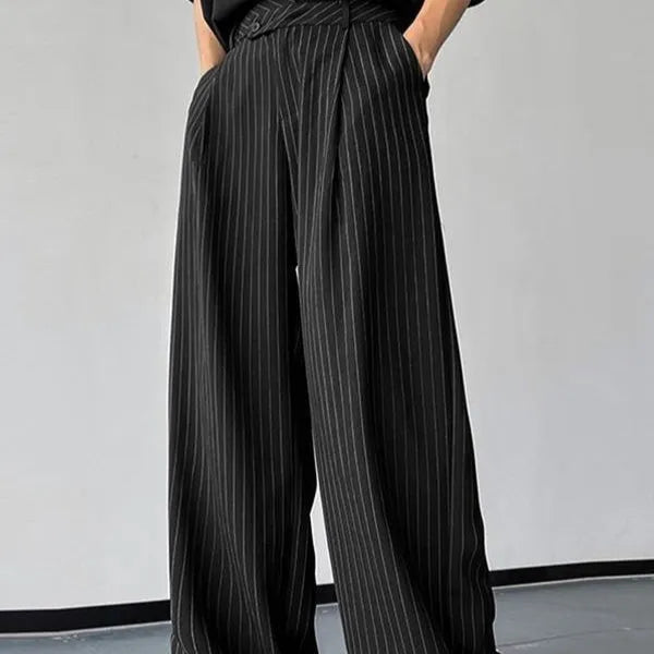 Black men's casual trousers with vertical stripes, front pleats, and an elasticated waistband.