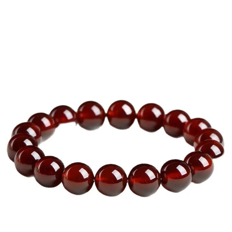 Natural orange red garnet crystal ball bracelet with ruyi charm detail in retro unisex style