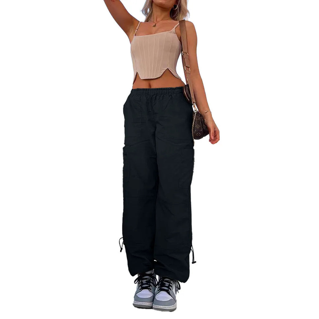 Loose-fit straight leg cargo pants with multiple pockets in a grey colour.