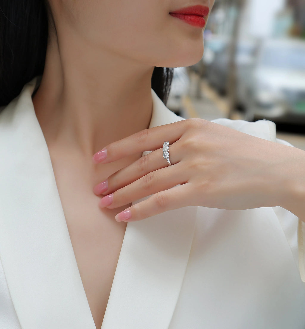 0.5 carat moissanite wedding ring set in S925 silver with platinum plating, gold colour, on white background