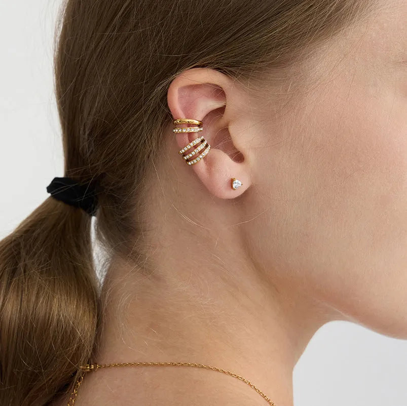 Women's stainless steel non-piercing clip-on earrings with geometric ring shape and electroplated finish in JDE0309004 colour.