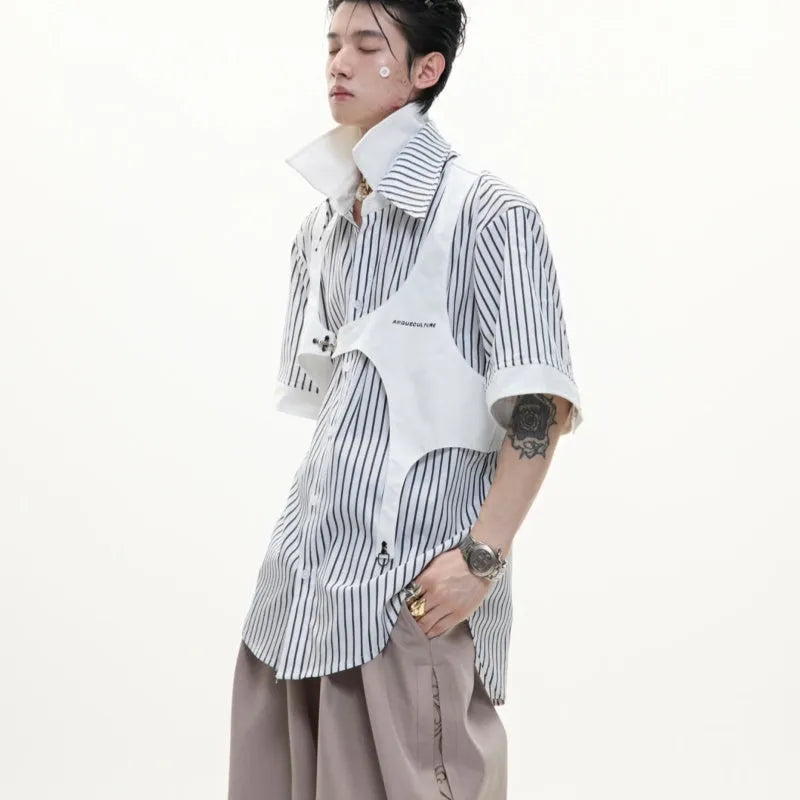 Man modelling a black and white striped cotton shirt with a double collar design and short sleeves.