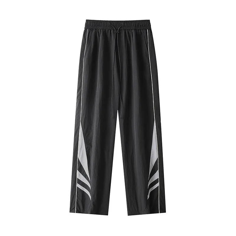 Men's black loose-fit straight-leg sports trousers for summer, shown on a hanger.