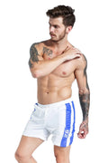 Men's blue elastic sports shorts with lace-up front and slim fit design