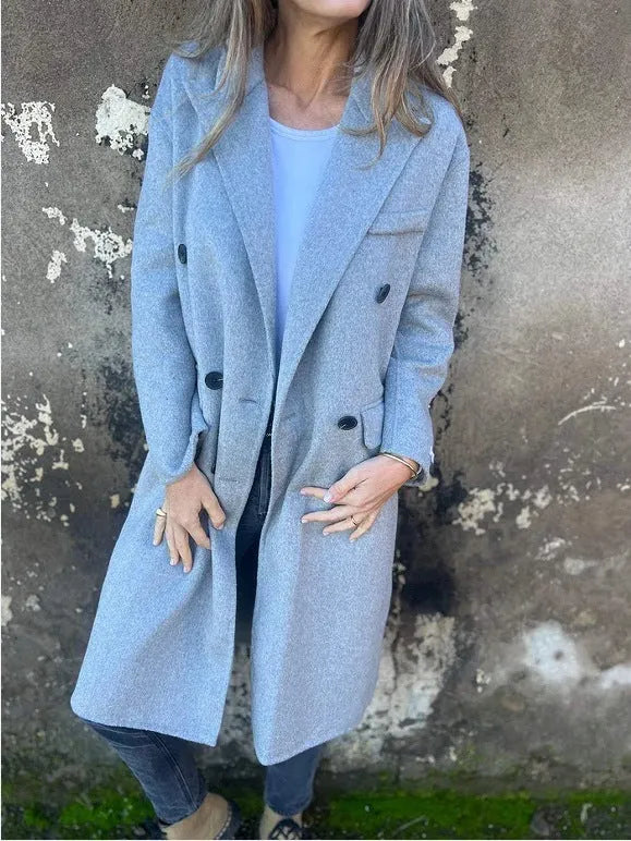 Women's mid-length lapel double-breasted long sleeve jacket in solid colour polyester, loose fit, front view