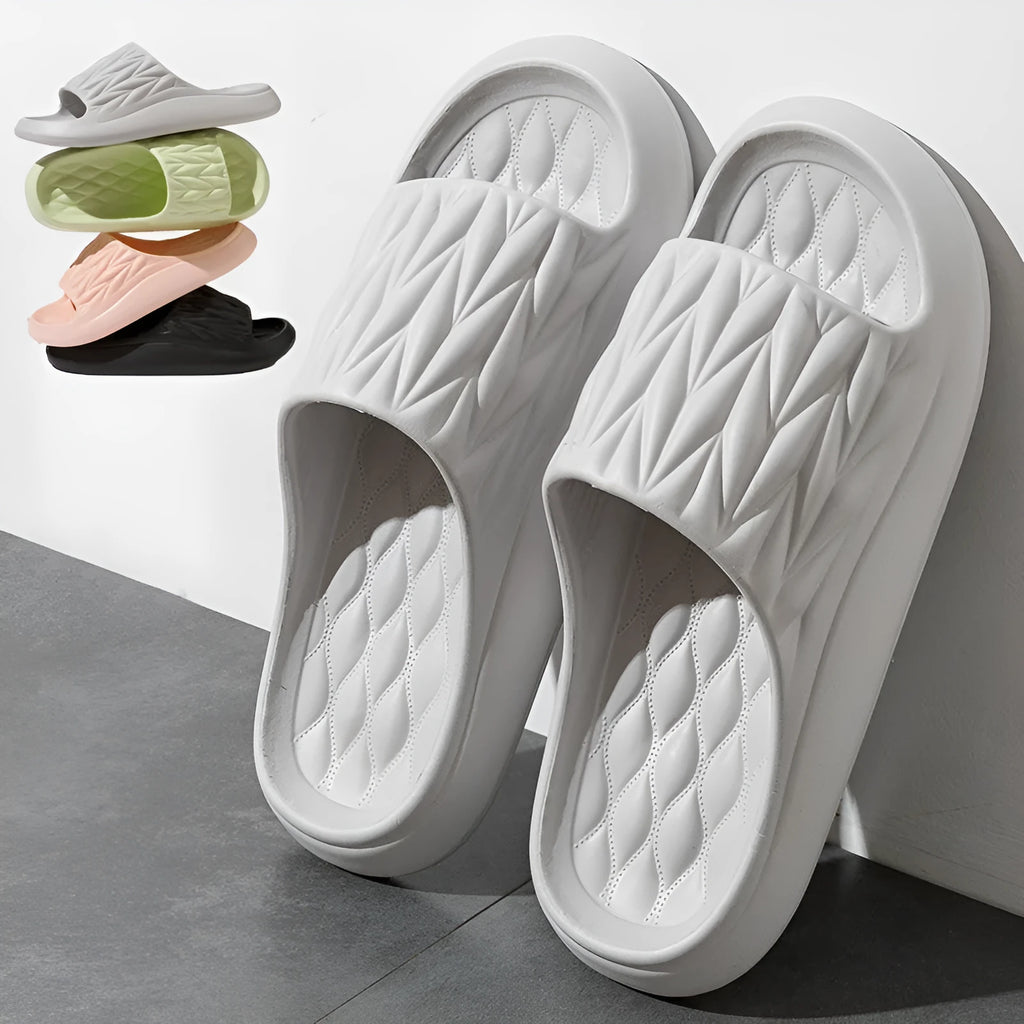 Leaf texture design EVA household slippers in various colours on a non-slip sole.