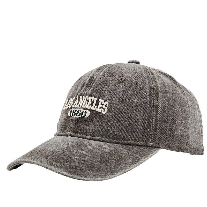 Personalised adult peaked cap with distressed letters embroidery in adjustable sizing