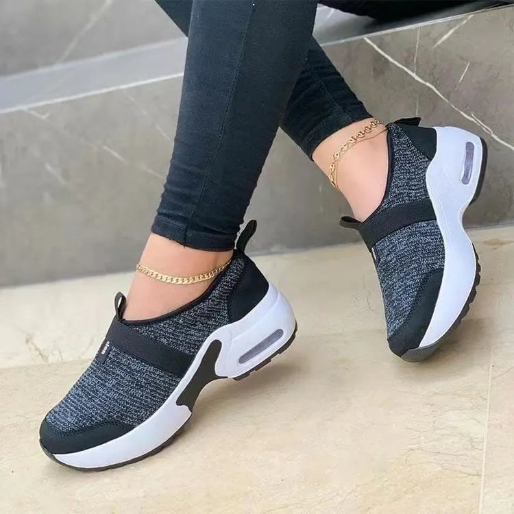 Women's white mesh flat sneakers with round toe and colour stitching details