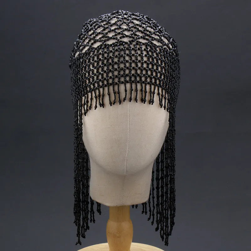 Handmade beaded belly dance hat with tassel decorations in silver colour